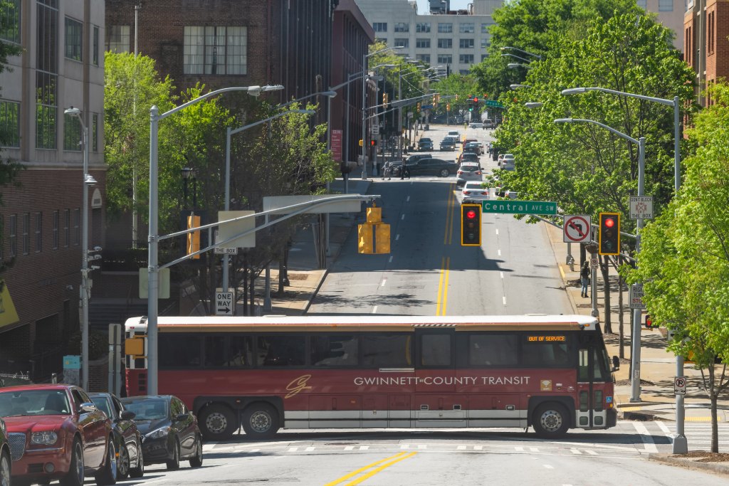 Gwinnett County Transit Bus Crossing Central Avenue in Downtown Atlanta.jpg